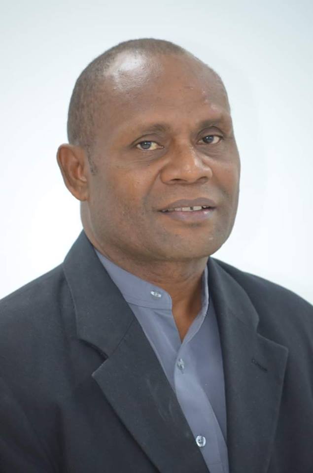 A portrait of the late Hon. Peter Tom