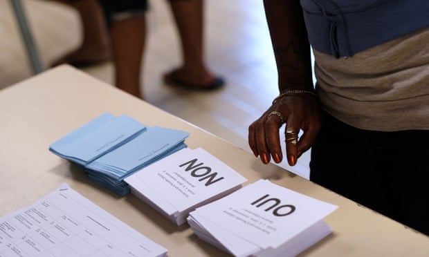 Voters arrive to cast their ballots in the referendum on New Caledonia’s independence from France. Photograph: Theo Rouby/AFP/Getty