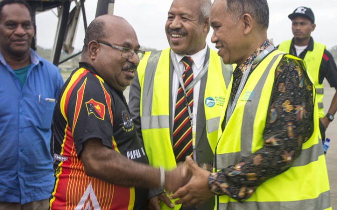 As Port Moresby's Governor Powes Parkop (middle) welcomed his counterpart from Indonesia's Papua province Lukas Enembe (left) in Papua New Guinea's capital, the Indonesian ambassador to PNG, Ronald Manik (right), also made an appearance. Photo: Wanpis Ako
