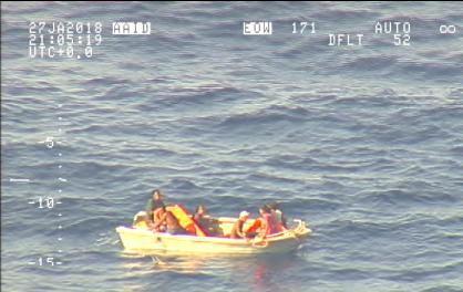 A handout photo supplied by the New Zealand Defence Force shows survivors from a ferry that sunk floating in a boat in the sea near the South Pacific nation of Kiribati, January 27, 2018. Picture taken January 27, 2018. New Zealand Defence Force/Handout via REUTERS
