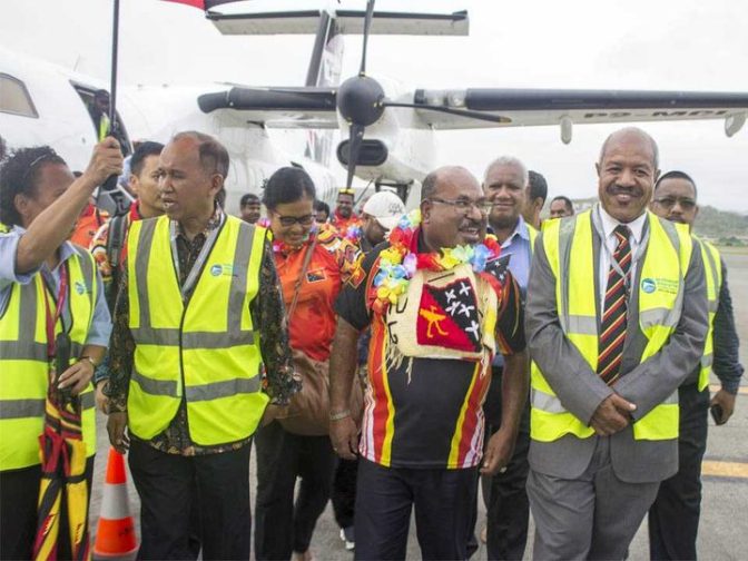 From left: Indonesian ambassador to PNG, His Excellency Ronald Manik, Governor Enembe, Governor Parkop and others walking out of the tarmac at Jackson's International Airport in Port Moresby. Photo: Wanpis Ako