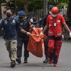 14 people injured in suspected suicide bombing outside Catholic church in Indonesia